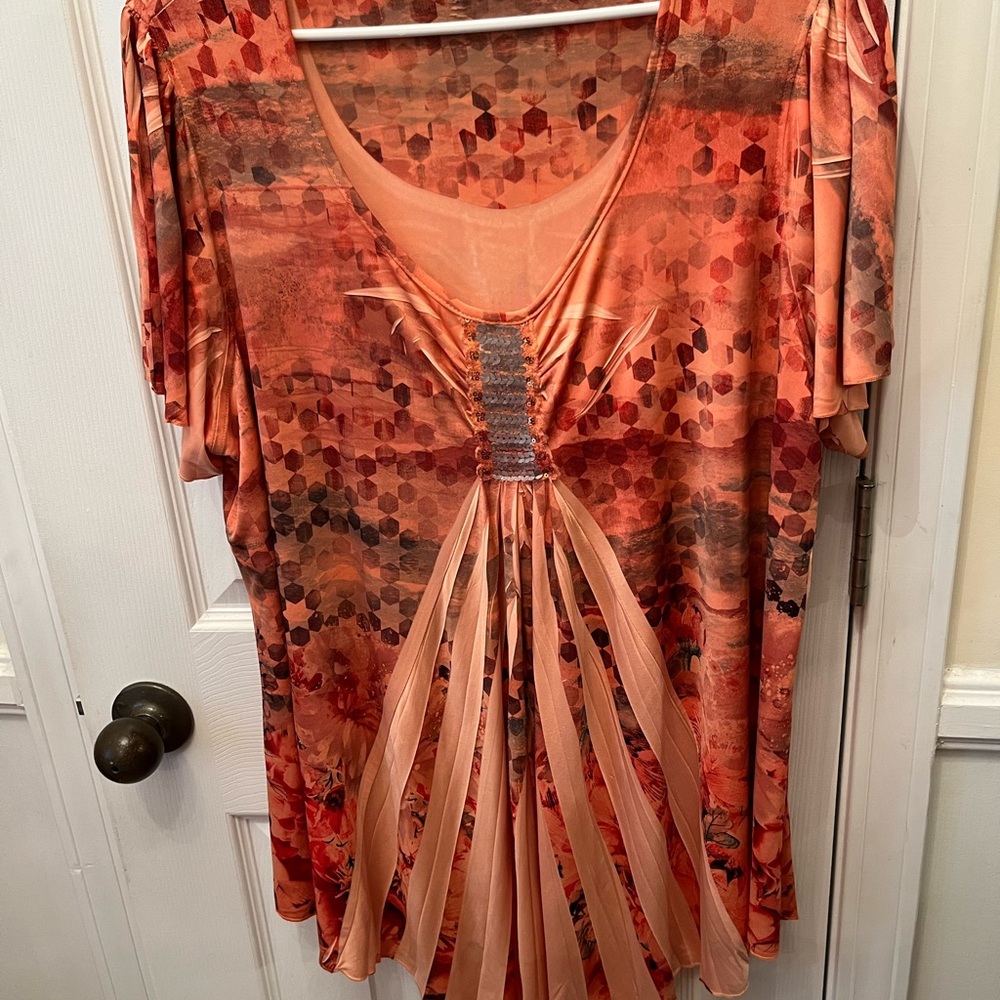 Brand… world unity blouse in a few tones of color. Front is 25” long and